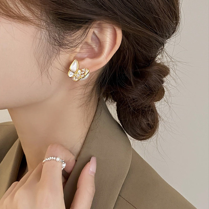 Butterfly stud worn on the ear, side view