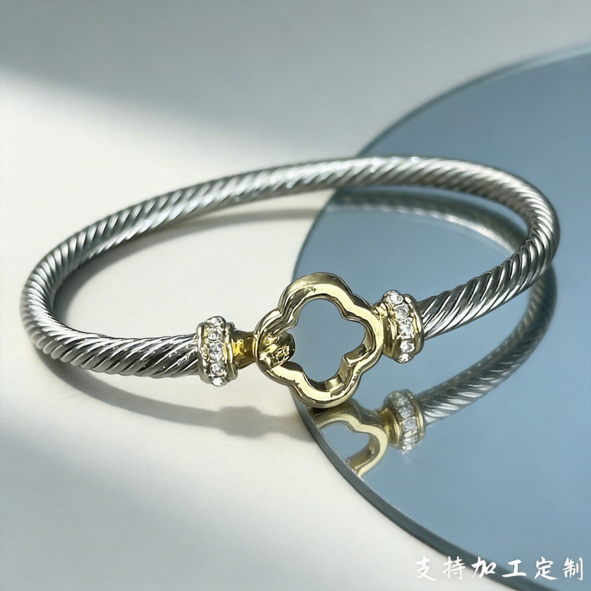 Two-tone twisted cable open clover cuff bracelet