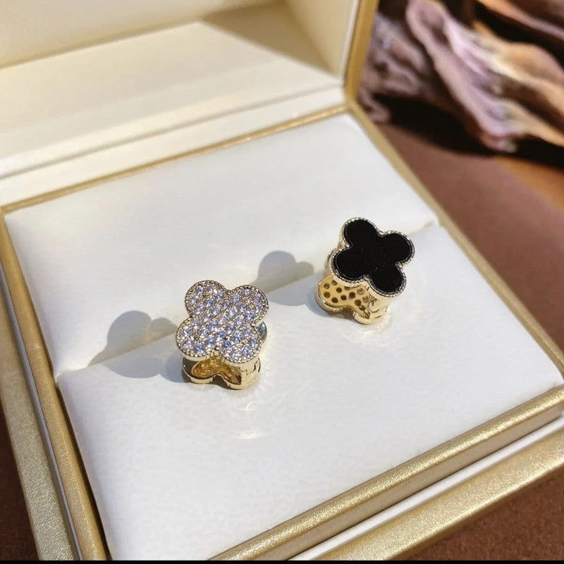 Black pavé clover two-sided huggie earrings
