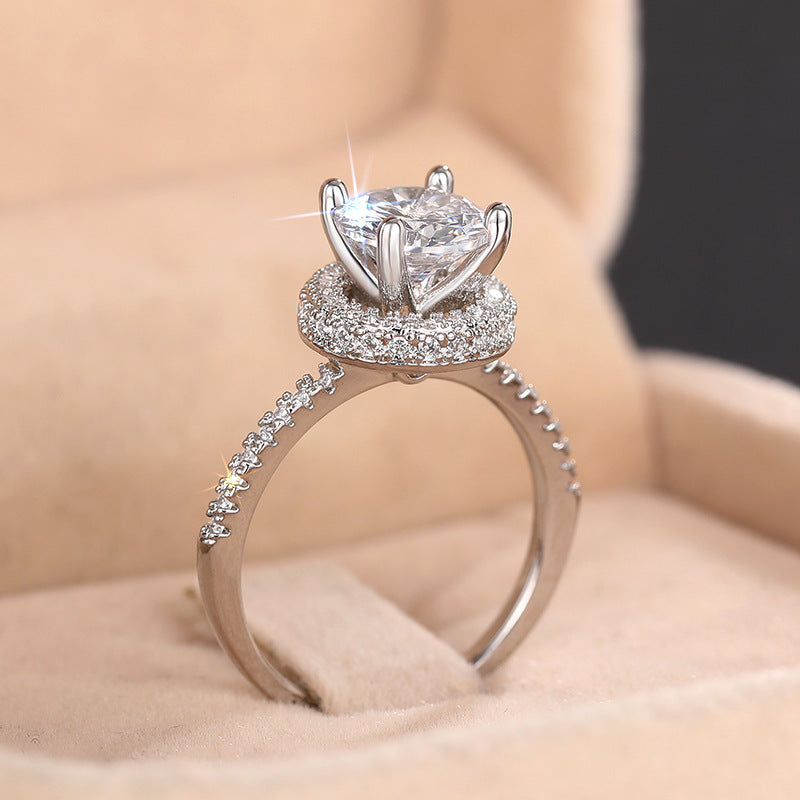 Round solitaire pavé ring side view