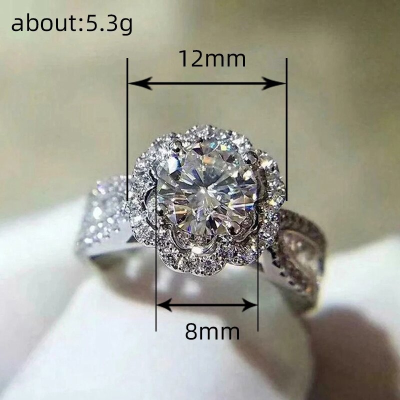 Halo ring size: 12 mm halo, 8 mm stone
