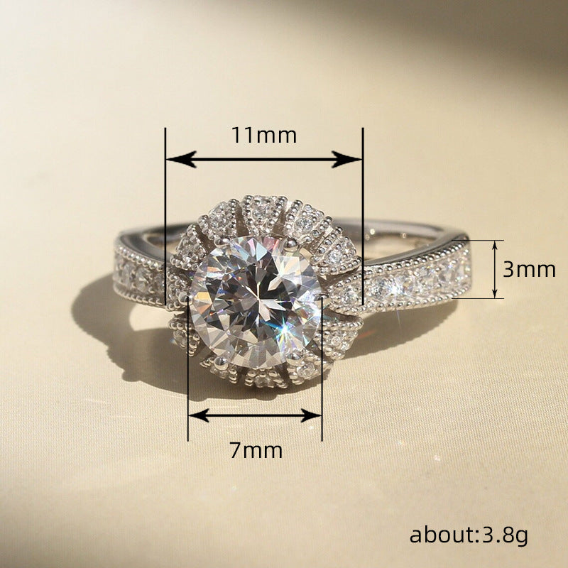 Sunflower halo ring size: 11 mm halo, 7 mm stone