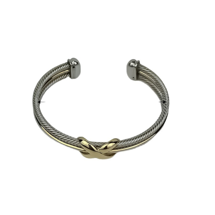 Two-tone cable X cuff on white