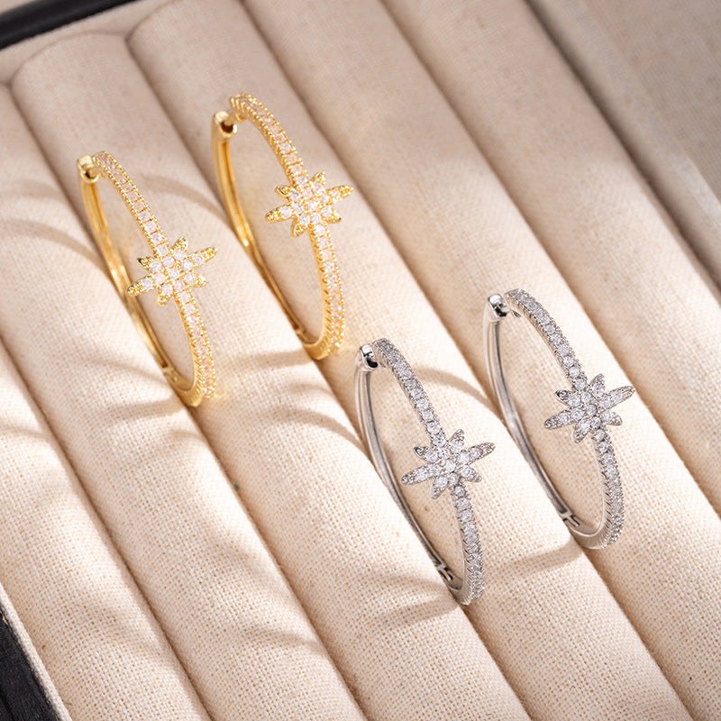 North star pavé hoops on display