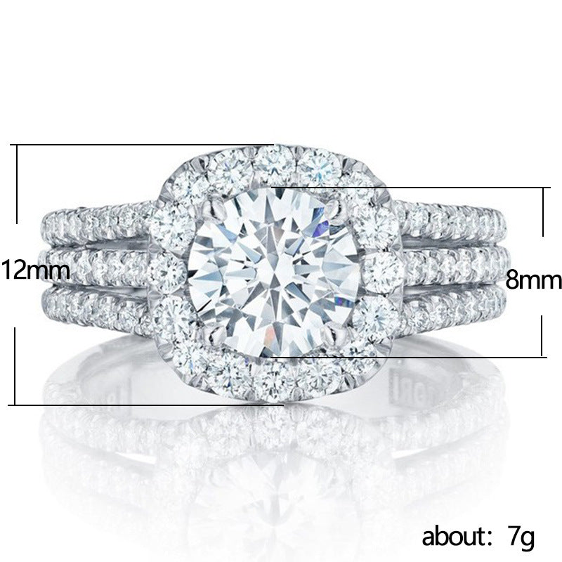 Cushion halo pavé ring on white with size