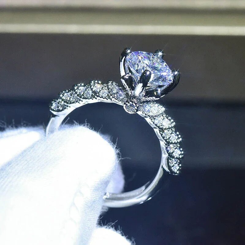 Silver vintage six-prong solitaire pavé ring