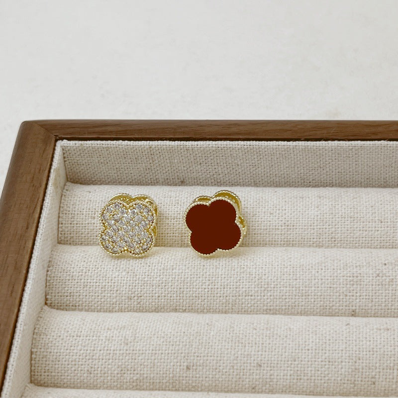 Red pavé clover two-sided huggie earrings