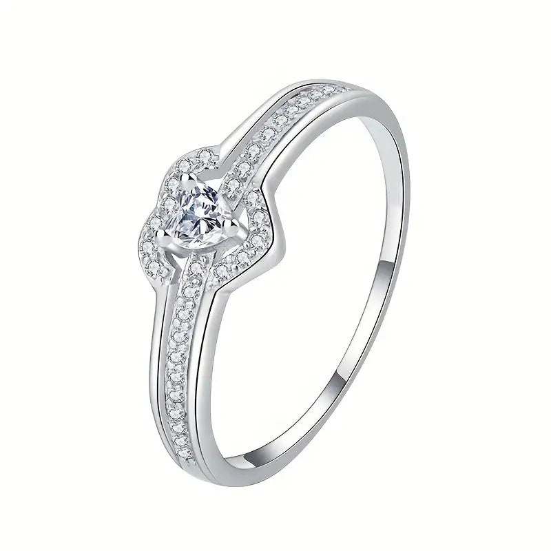 Pavé heart halo ring on white