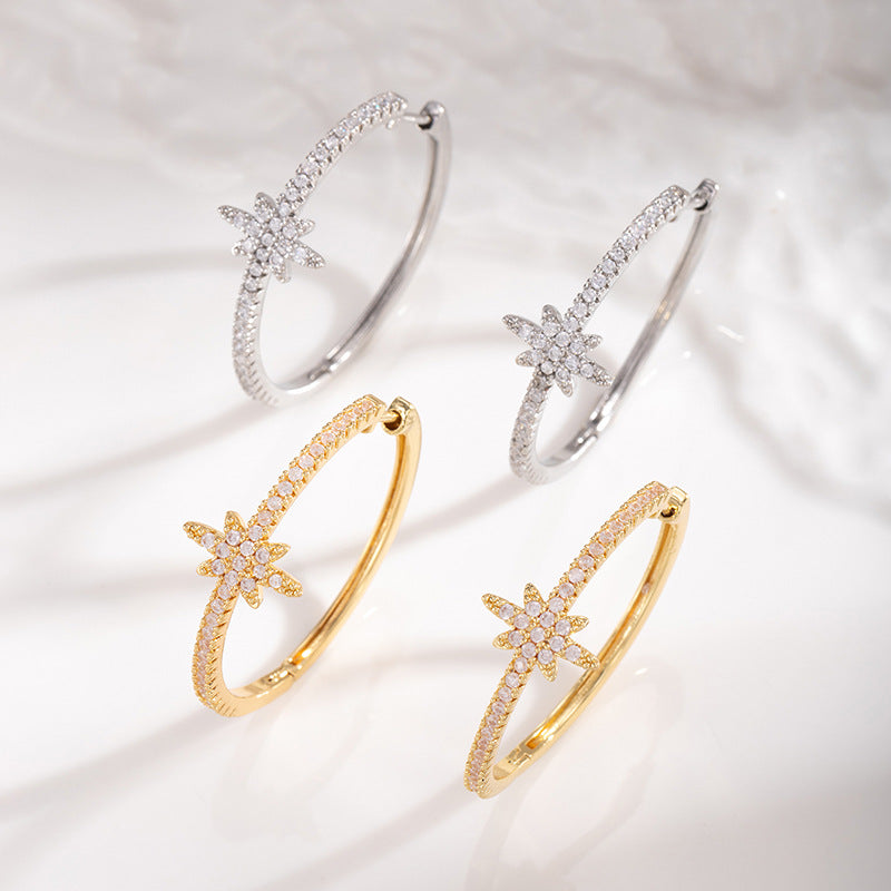 North star pavé hoops in gold and silver