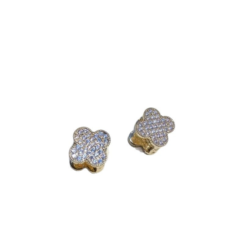 Pavé crystal clover side of the huggie earrings
