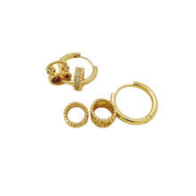 Gold pavé barrel charm huggie hoop earrings on white