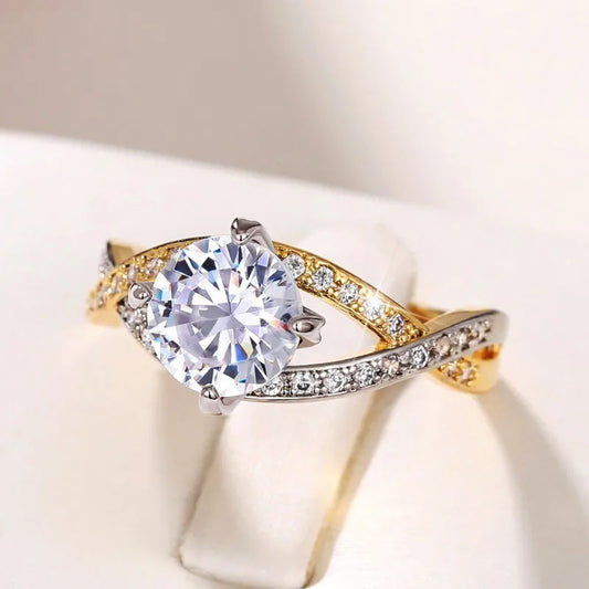 Two-tone twisted solitaire ring front view
